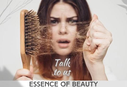 A woman holding her hair and freaking over hair loss